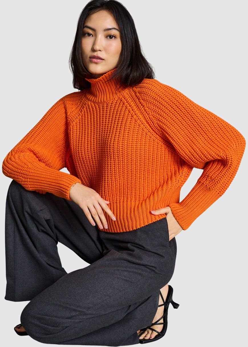 bright orange turtleneck